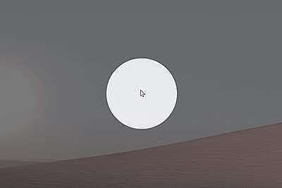 Uno schermo oscurato da un filtro semitrasparente e un cursore con intorno un cerchio giallo